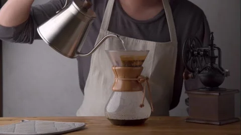 Man dripping coffee with carafe Stock Footage 143127013