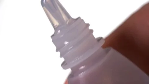 Man dripping eye drops in the eye Stock-Footage 73716757