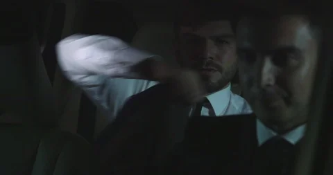 Man drive in the back of a car at night. Stock Footage 116670108