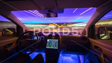 The man drive car in the city highway. Evening night time Stock Photos