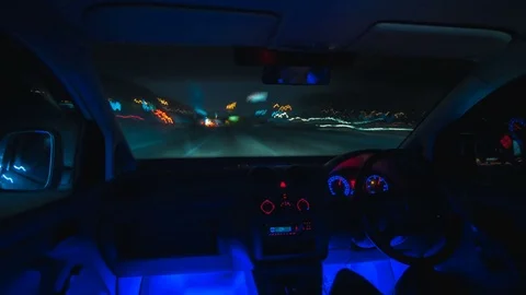 The man drive a car in the with a left side. Night time. Hyperlapse Stock Footage