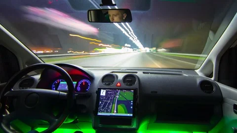 The man drive a car on the night highway. Inside view. Hyperlapse Stock Footage