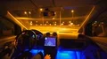 The man drive a car on the overpass. inside view. evening night time, real time 4k or 4k+ Resolution