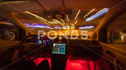 The man drive on the highway. Evening night time. Wide angle Stock Photos