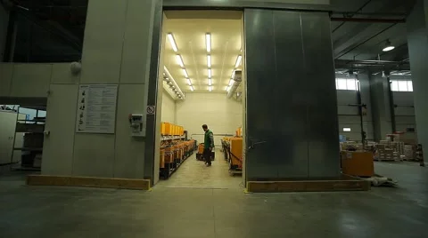 Man driven by the battery charging station Stock Footage 64336660