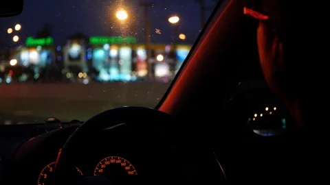 Man driver driving car stop on crossroad with red traffic light Stock Footage 88333278