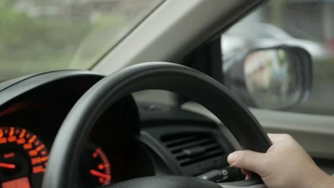 Man Driver Hand On Car Steering Wheels.  Travelling Vacation Road Trip Advent Stock Footage 258749852