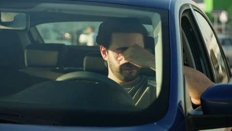Man Driver Sitting in Car close-up, Traffic Jam. Car Sharing concept, Vehicle Video stock 220805272