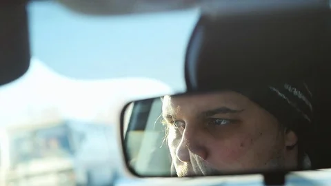 Man drivers the car in slow motion on winter landscape outdoors in sunny day Stock Footage