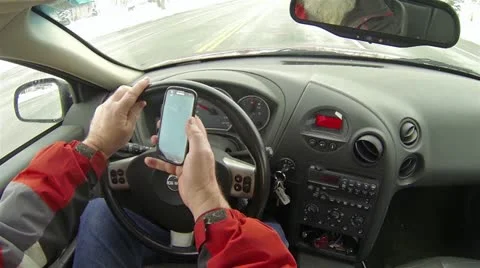 Man drives and text in cell phone as driving HD Stock Footage