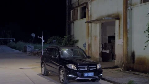 Man drives away from warehouse Stock-Footage 235276397