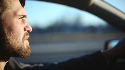 A man drives a car. Close up profile shot Stock Footage 48224433