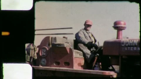 Man Drives CONSTRUCTION Machinery Earthmovers 1950s Vintage Film Home Movie 4648 Stock Footage 12264413