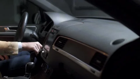 Man drives the engine of an expensive car with a key Stock Footage 91829154