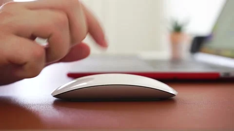 A man drives a white fly with his hand on the table, scrolls the touchscreen Stock Footage 156790382