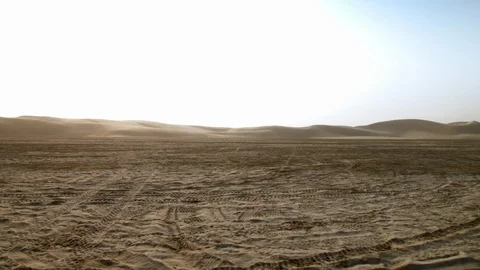 A man driving ATV in a desert in Qatar Stock Footage 86357959