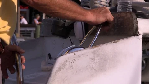 Man driving a boat Stock Footage 72987766