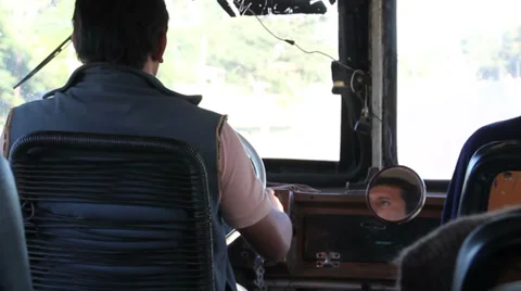 Man driving a bus on a bumpy and dirt road in Argentina Stockbeeldmateriaal 33334927