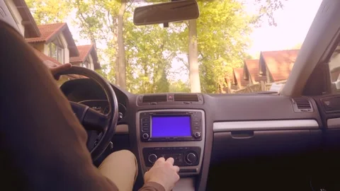 Man driving car and use navigation. Blue screen in multimedia Stock Footage 247082437