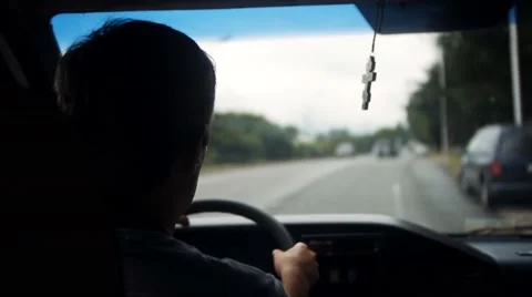 Man driving a car. Focus on the road Stock Footage 66475567