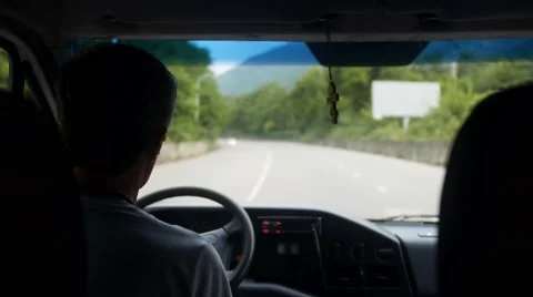 Man driving a car. Focus on the road Stock Footage 66476569