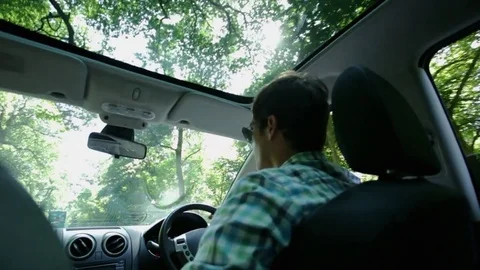 Man driving car Stock Footage