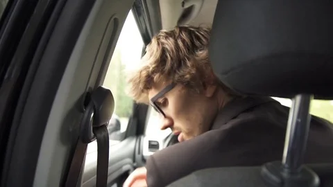 A man driving a car Stock Footage 79499835