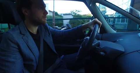 Man driving a car Stock Footage 94564170