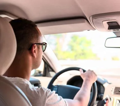 Man driving a car. inside shoot Stock Photos