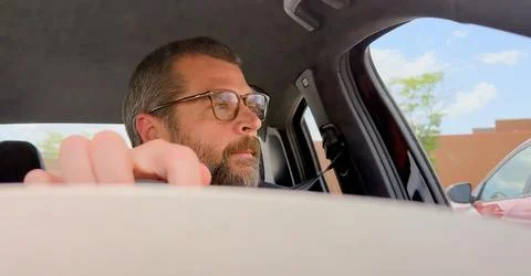 Man Driving Car Looking Through Windshield POV Stock Photos
