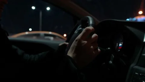 Man driving car nervously taps his finger on the steering wheel. Stock Footage 149136160