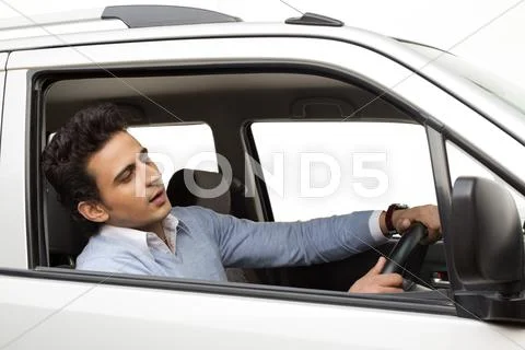 Man driving a car Stock Photos