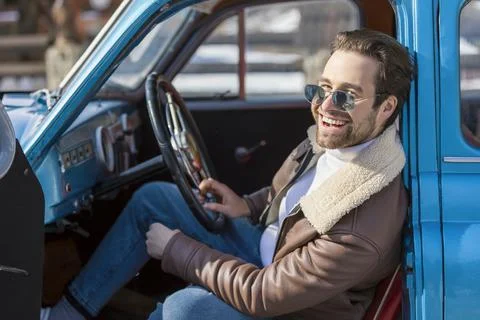A man driving a car Stock Photos