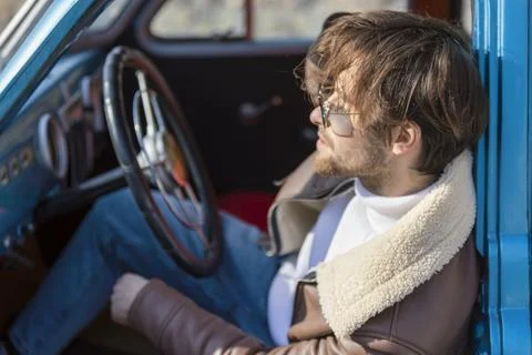 A man driving a car Stock Photos