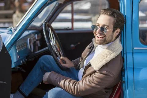 A man driving a car Stock Photos