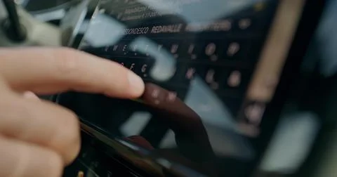A man is driving a car Stock Photos