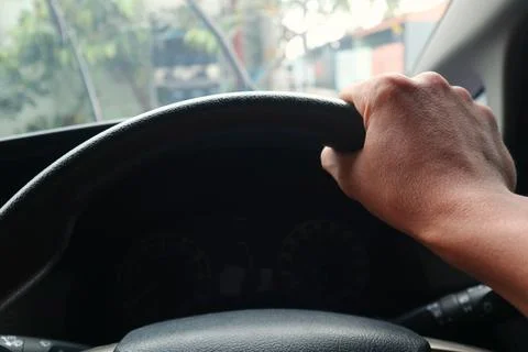 A man is driving a car Stock Photos