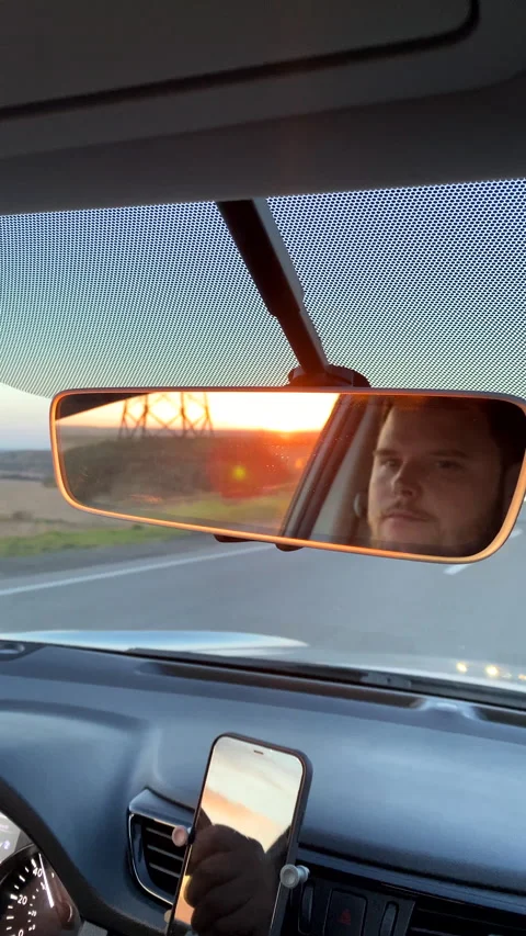 Man driving car on sunset Video stock 221549227