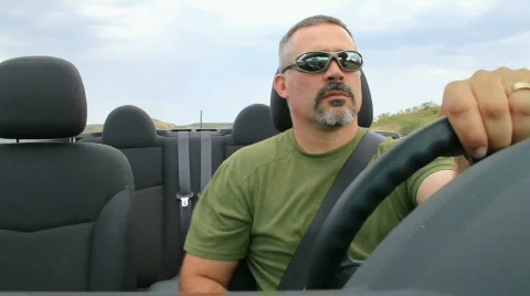 Man Driving Convertible with Top Down (HD) c Stock Footage 876132