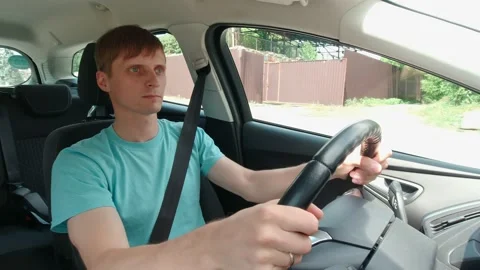 Man Driving Down The Street Stock Footage 156720036