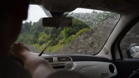 Man driving FIAT 500 on curvy Italian highway A7 Milano-Genova Stock Footage