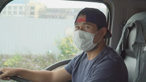 A man driving Stock Footage 129606546