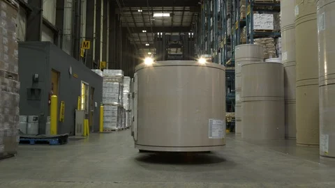 Man driving forklift machinery, elevating and placing cylindrical shape stock on 動画素材 88028834