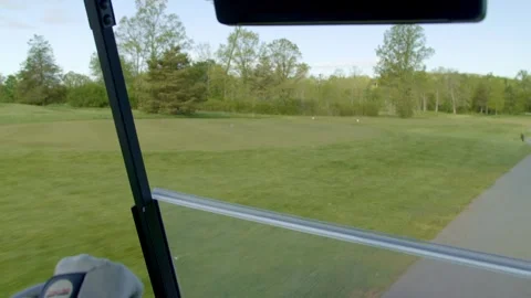 Man driving golf cart Stock Footage 307943900