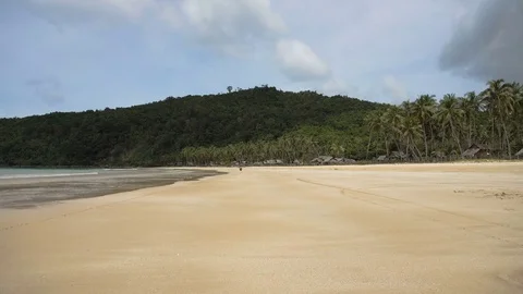 Man driving a motorcycle on beach. Stock Footage