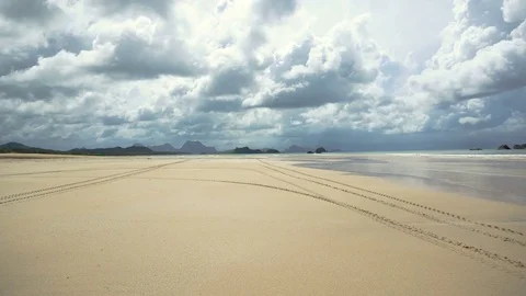 Man driving a motorcycle on beach. Stock Footage 77299092