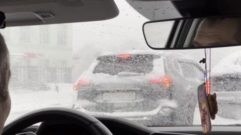 A man is driving in the rain Stock Footage 279057043