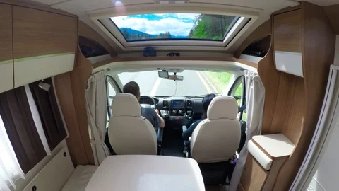 Man driving on a road in the Camper Van RV Stock Footage 88489629