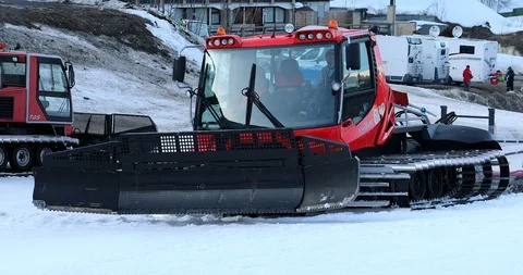 Man Driving A Snowcat Stock Footage 124026681