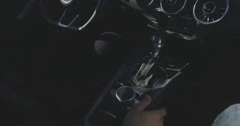 Man driving a sport car while shifting gears black dashboard Stock Footage 100037322